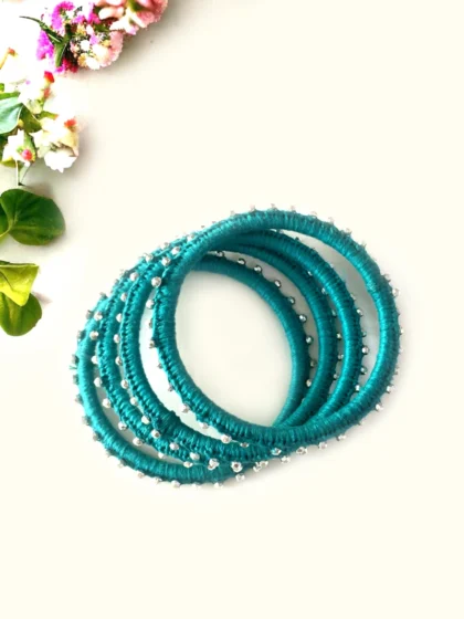 thread bangles with silver beads
